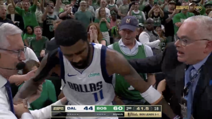 Kyrie Irving falls onto Celtics fans at NBA Finals